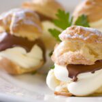 Decadent Profiteroles Filled with Light Whipped Cream Bliss